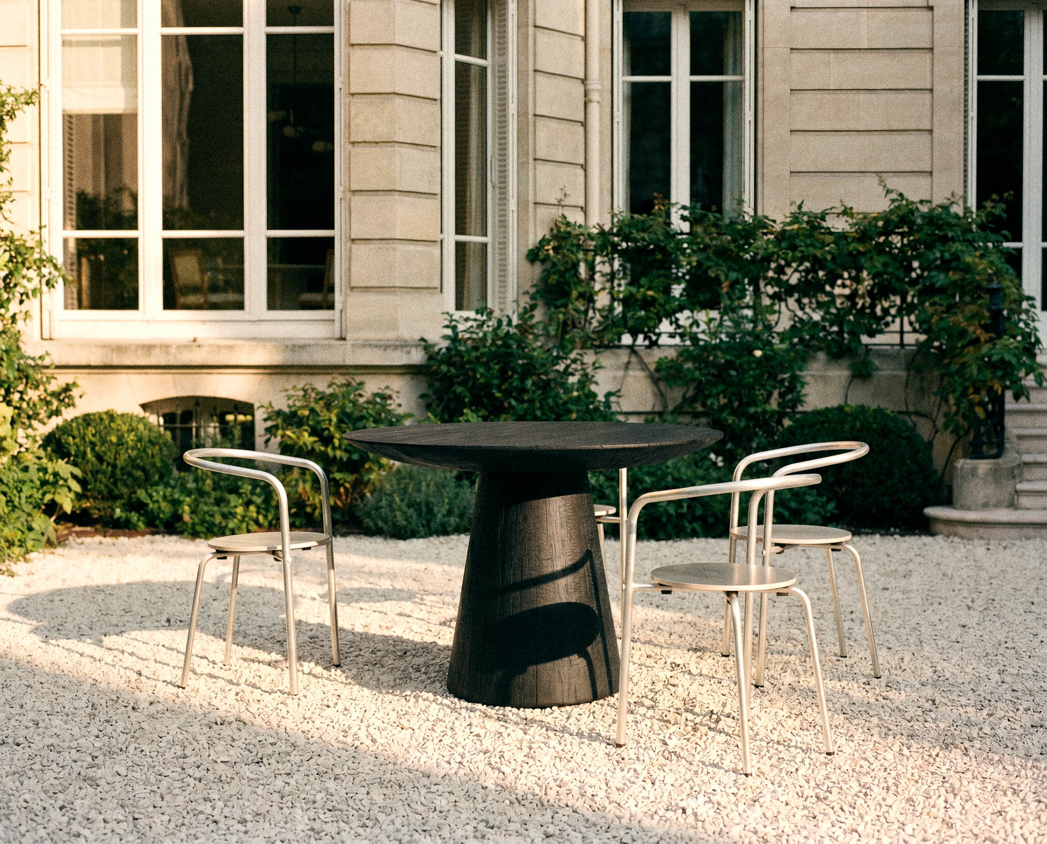 Amok Outdoor Round Table by Carmworks at Savannah Bay Gallery